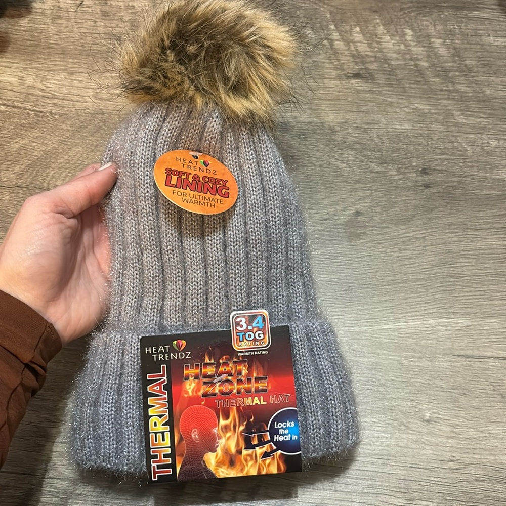 NWT Heat Trendz gray beanie with puff ball